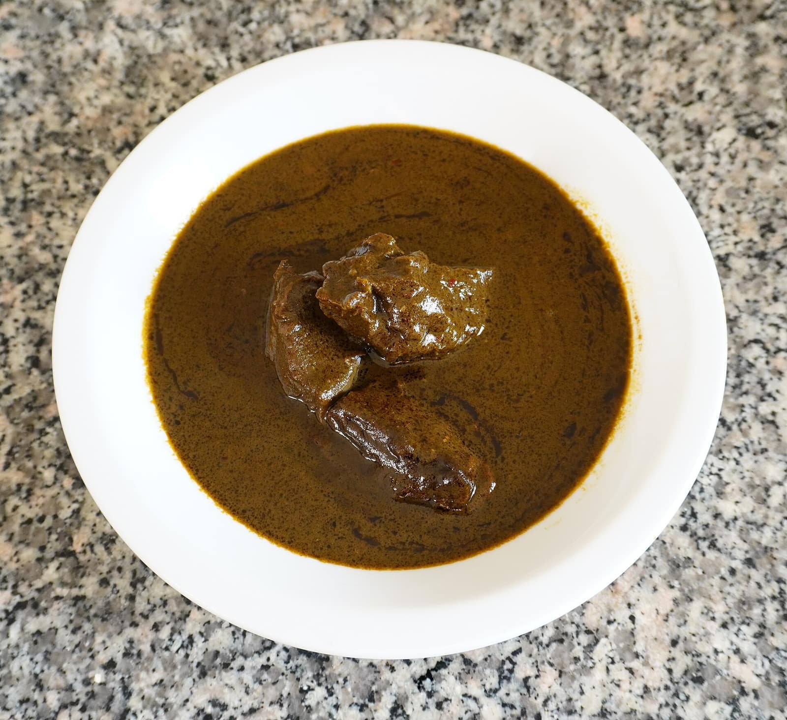 Mloukhia noire tunisienne, viande confite dans sa sauce de corète réduite